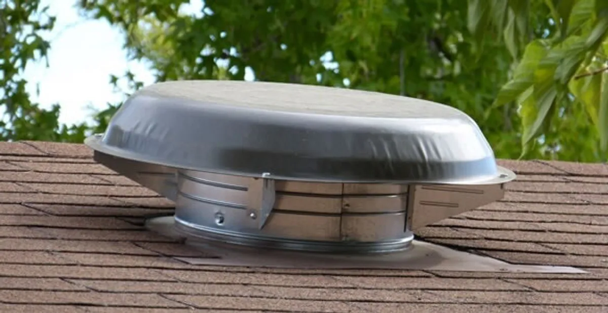 attic fan installation services with low-profile roof ventilation unit in Los Angeles, CA